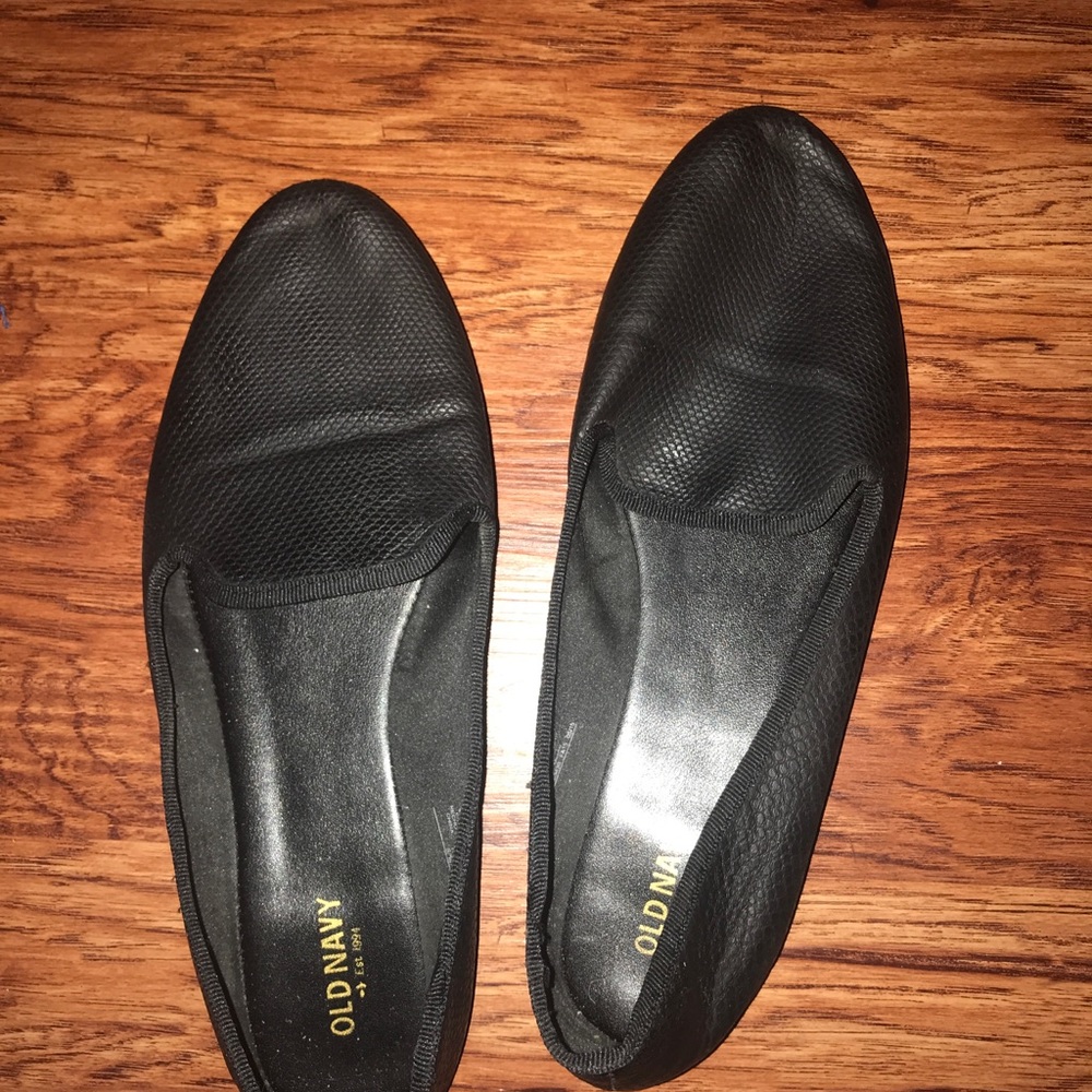 Black moccasin style flats
